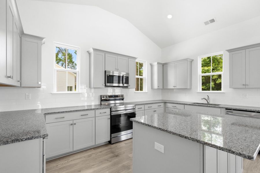 Furnished interior view inside a new home in Downtown Loris Homes, Loris (Image 9).