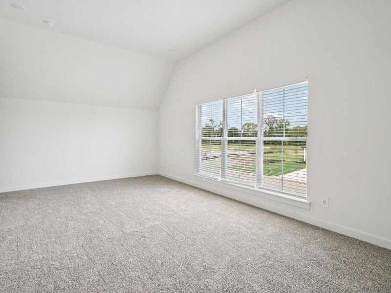 The primary suite offers a private retreat.