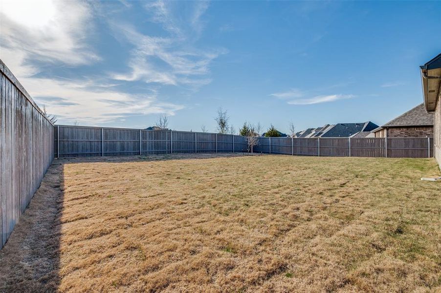 Exterior details and patio area of a home in Prairie Ridge at Goodland, Venus (Image 4).