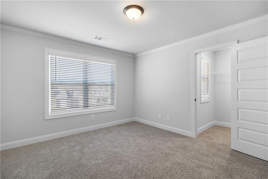 Spacious, unfurnished interior of a new home in Calgary Downs, Winder (Image 14).