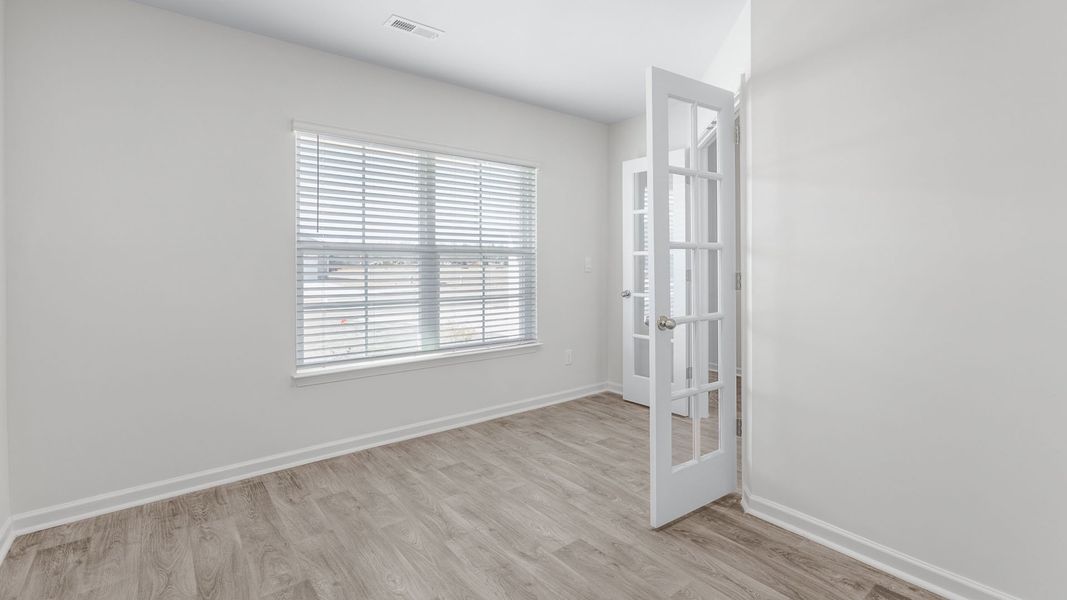 Spacious, unfurnished interior of a new home in English Farm, Archdale (Image 13).