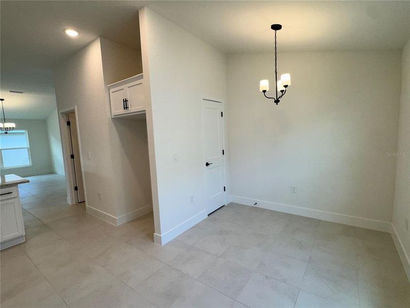 Spacious, unfurnished interior of a new home in Watercress Cove, North Port (Image 6).