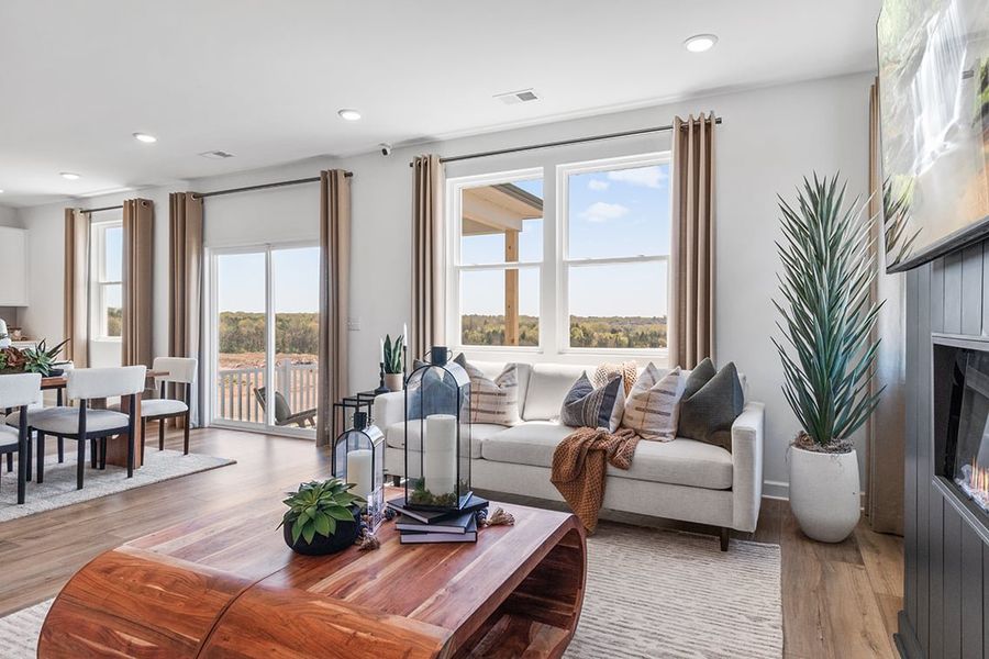A living room with a fireplace.