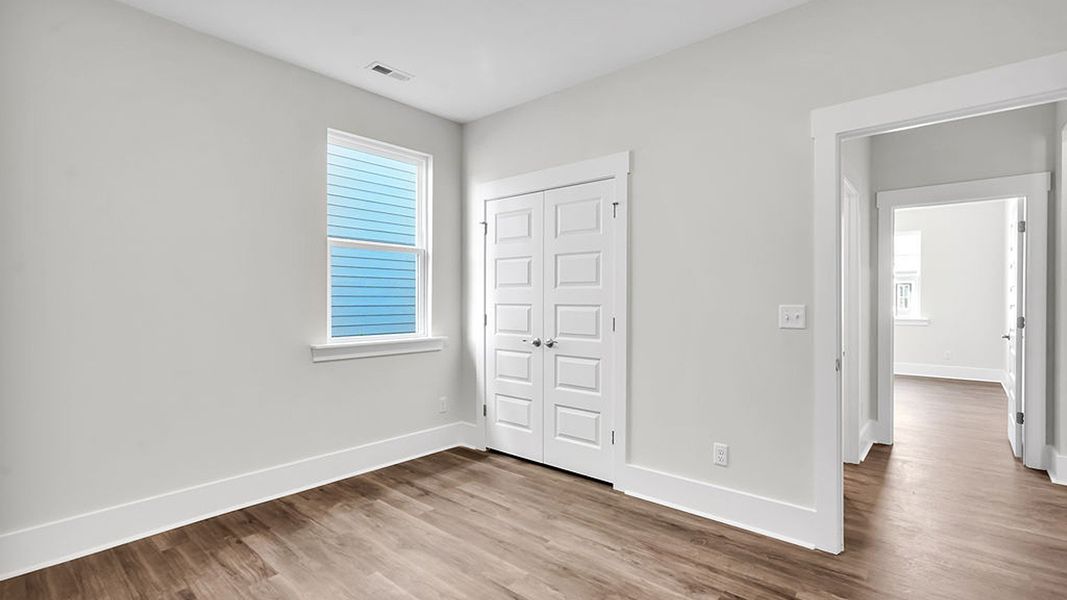 Spacious, unfurnished interior of a new home in The Haven at Indigo Preserve, Leland (Image 19).