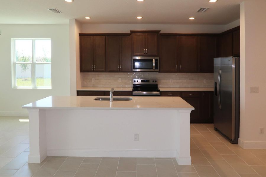 Furnished interior view inside a new home in Ridgeview, Clermont (Image 11).