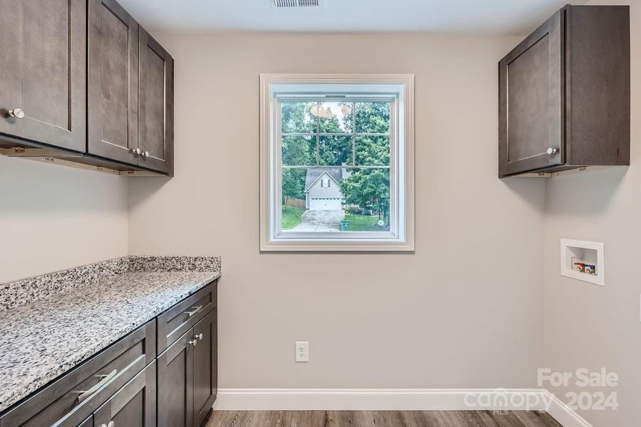 Designate laundry room with lots of storage