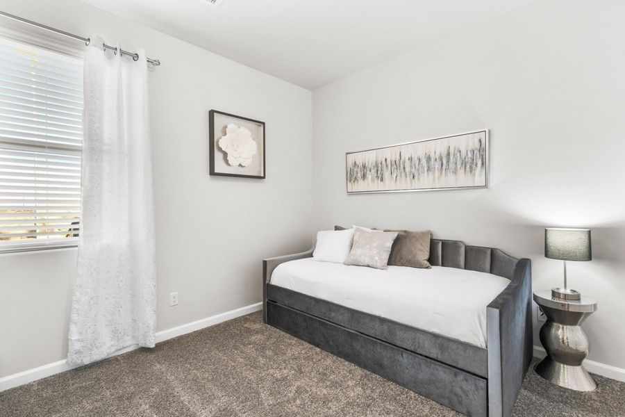 Representative furnished interior of a home built from the Valencia by Hakes Brothers in Hillside Park, El Paso (Image 32).