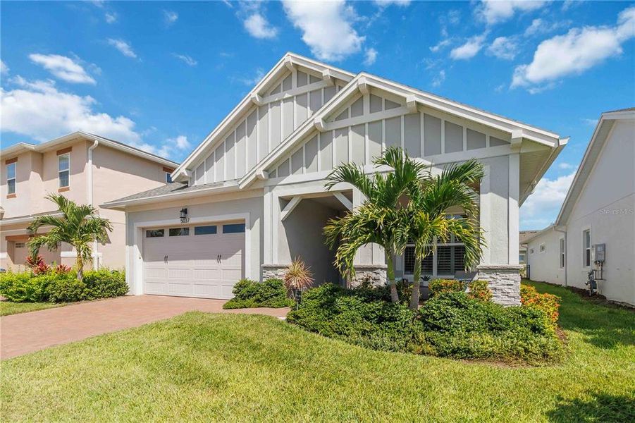 Front exterior of a new home in , St. Cloud, FL, highlighting curb appeal (Image 2).