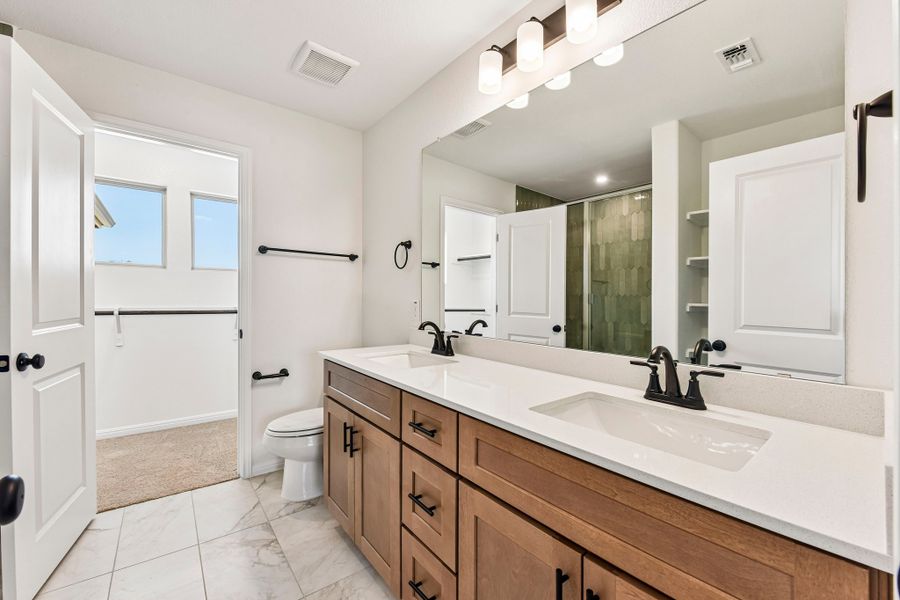 Furnished interior view inside a new home in Crosswinds, Kyle (Image 7).