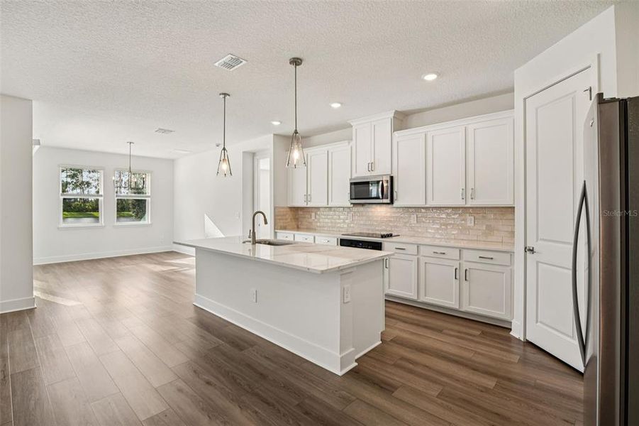 Furnished interior view inside a new home in Legends Preserve - Signature Series, Daytona Beach (Image 12).