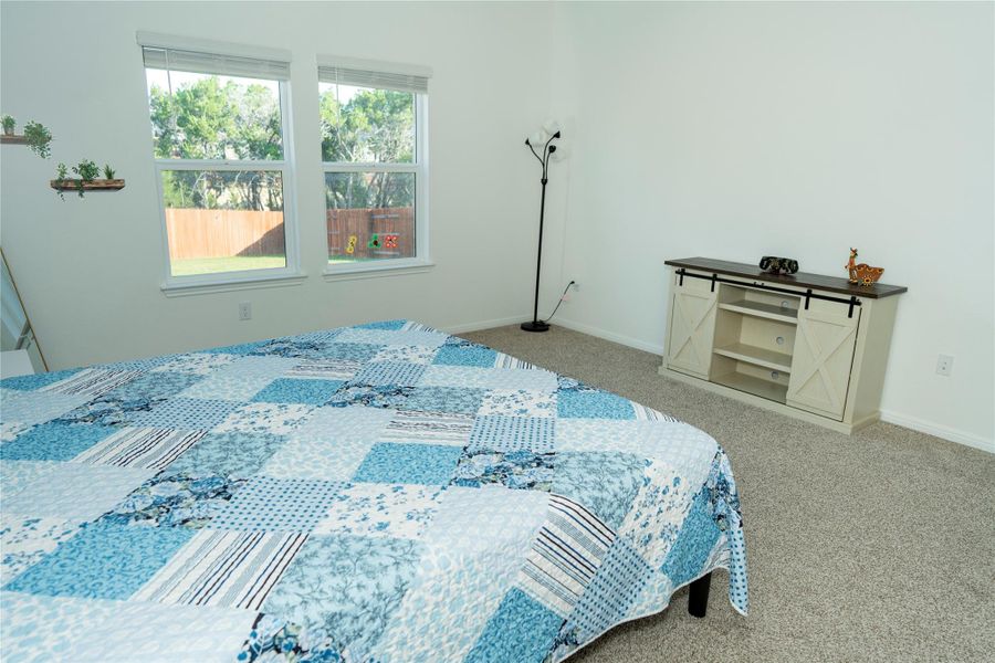 Furnished interior view inside a new home in Bar W Ranch, Leander (Image 5).