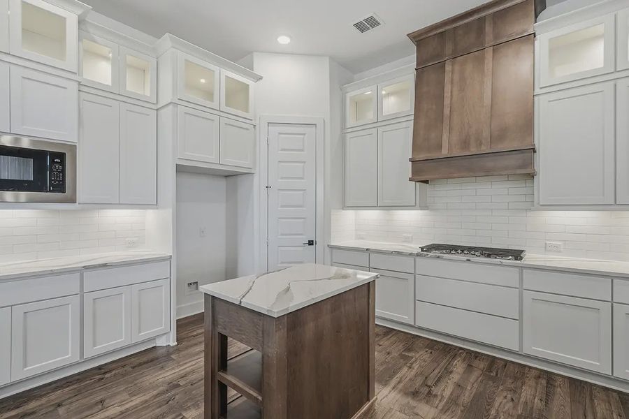 Representative furnished interior of a home built from the Kingston by Chesmar Homes in Prominence 60's, San Antonio (Image 16).