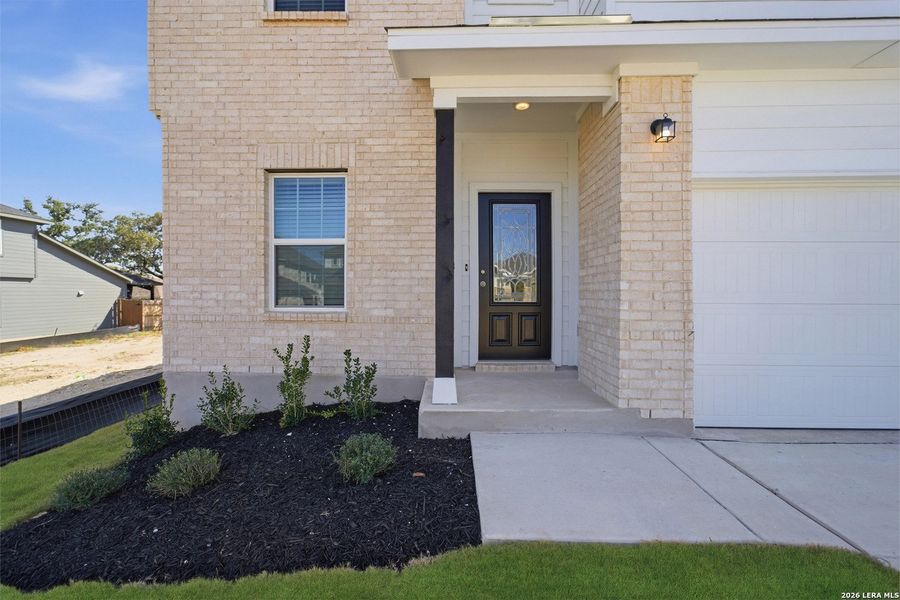 Exterior details and patio area of a home in Hunter's Ranch, San Antonio (Image 3).