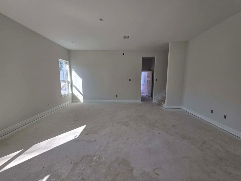 Living room, stairs to the right Living room, stairs to the right