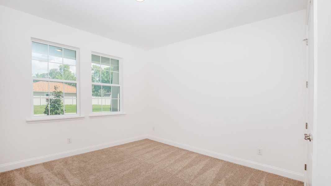 Representative unfurnished interior of a home built from the Naples by Maronda Homes in Golden Gate, Naples (Image 15).