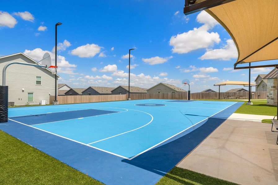 Community basketball court encourages an active lifestyle. Community basketball court encourages an active lifestyle.