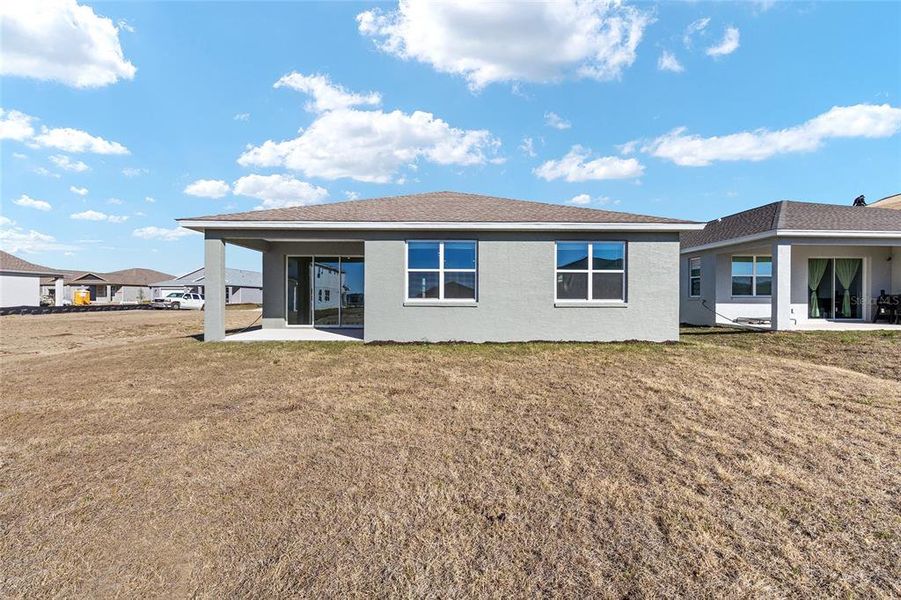 Exterior details and patio area of a home in Calesa Township, Ocala (Image 3).