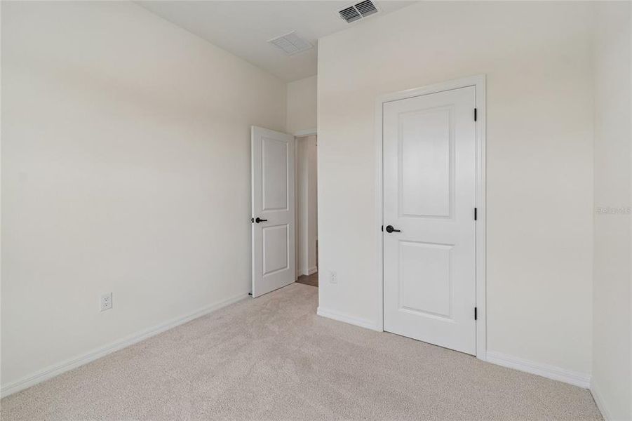 Spacious, unfurnished interior of a new home in Eastlyn, Bradenton (Image 13).