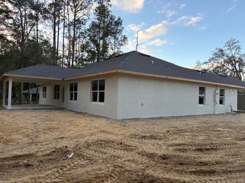 Exterior details and patio area of a home in , Ocala (Image 4).