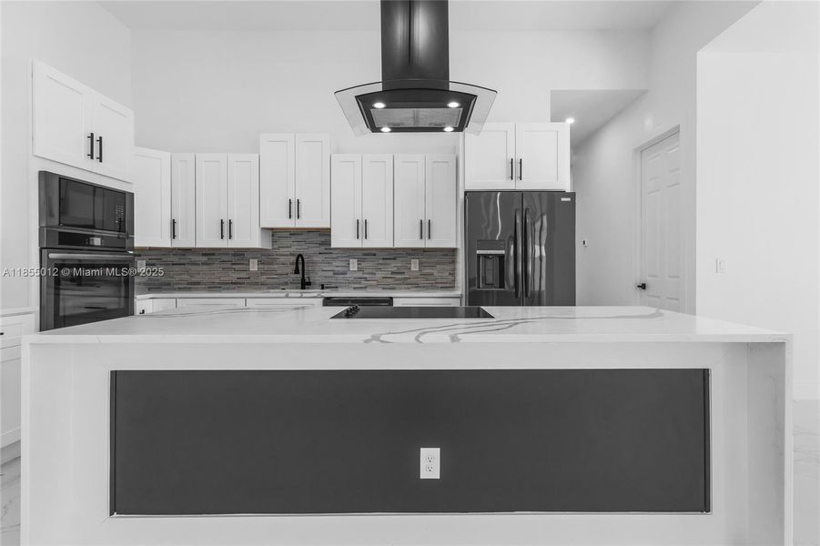 Oversized Island with Beautiful backsplash