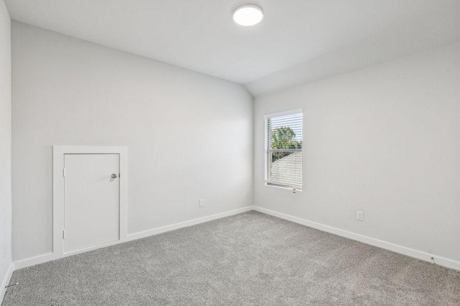 Bedroom in the Winters home plan by Trophy Signature Homes – REPRESENTATIVE PHOTO