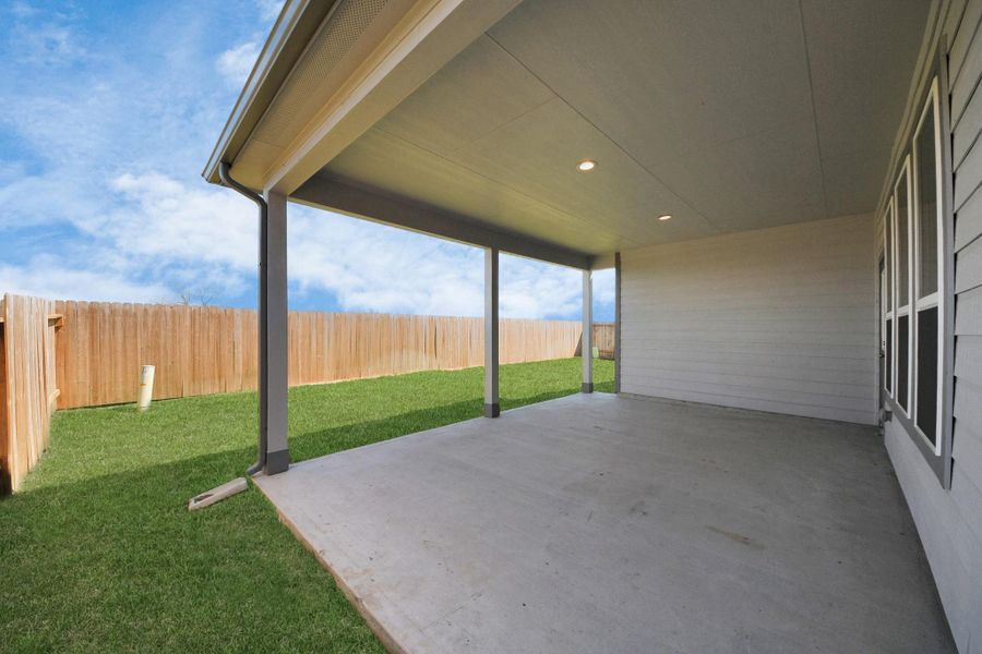 Experience outdoor living at its finest on this expansive covered patio, thoughtfully designed for BBQs and delightful outdoor dining Experience outdoor living at its finest on this expansive covered patio, thoughtfully designed for BBQs and delightful outdoor dining