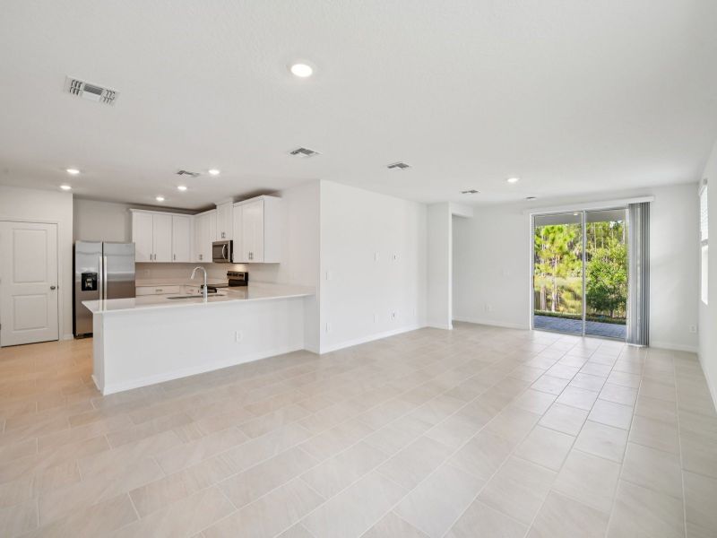 Spacious, unfurnished interior of a new home in Ridgehaven - Villas, Ormond Beach (Image 6).