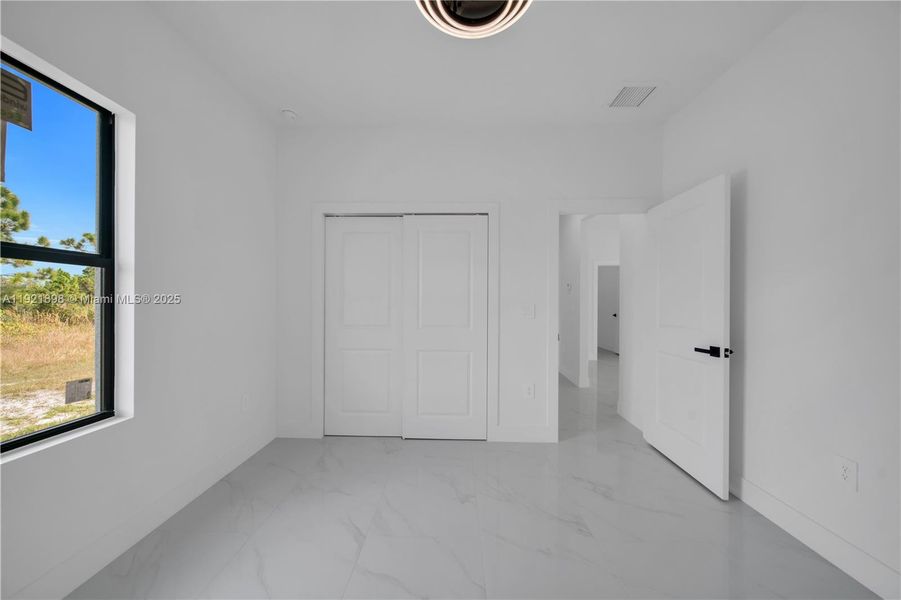 Spacious, unfurnished interior of a new home in , Lehigh Acres (Image 14). Spacious, unfurnished interior of a new home in , Lehigh Acres (Image 14).