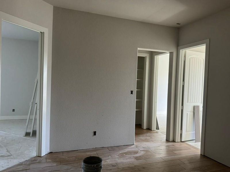 Spare room featuring light wood-style flooring