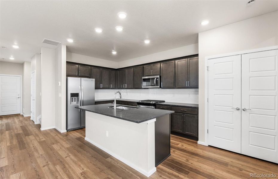 Furnished interior view inside a new home in Painted Prairie, Aurora (Image 5).