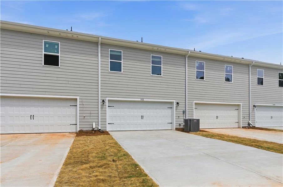 Exterior details and patio area of a home in Avery Landing, McDonough (Image 20).