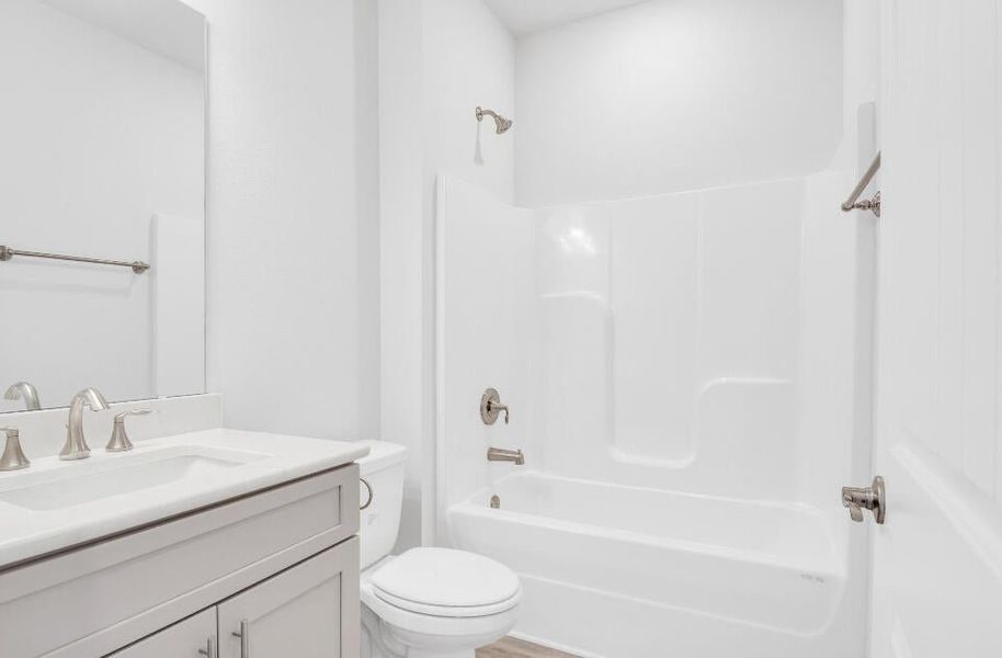 Furnished interior view inside a new home in The Bluffs at Lafayette, Freeport (Image 6).
