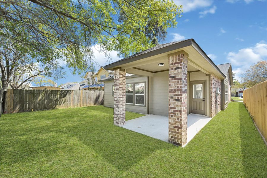 Exterior details and patio area of a home in , Spring (Image 3). Exterior details and patio area of a home in , Spring (Image 3).