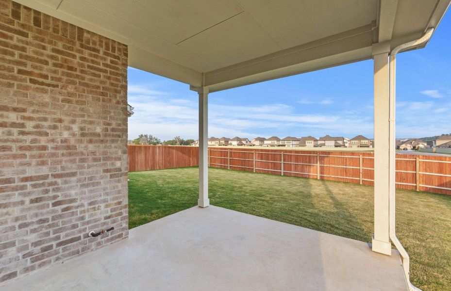 Exterior details and patio area of a home in Saddleback at Santa Rita Ranch, Liberty Hill (Image 21).