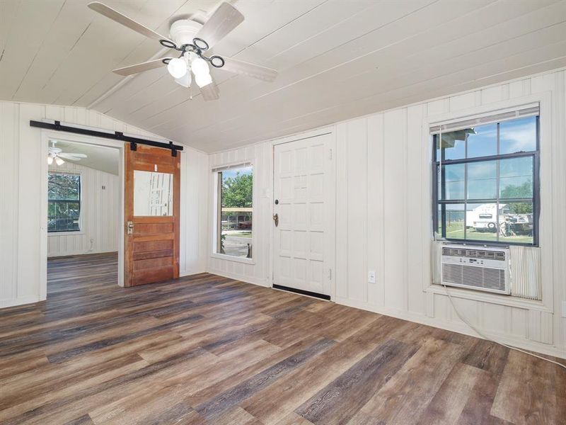 Barn door leads to bedroom - Views of lake
