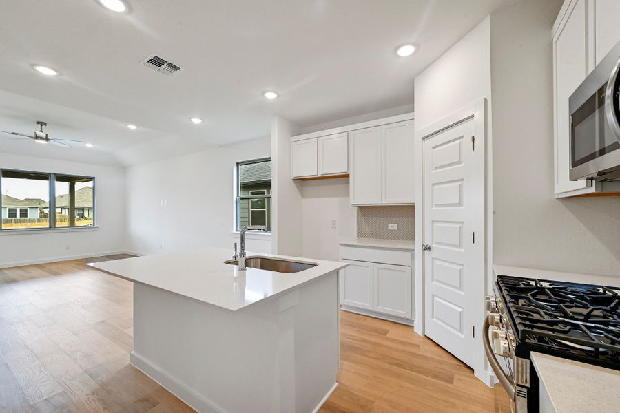 Furnished interior view inside a new home in Prairie Winds, Hutto (Image 8).