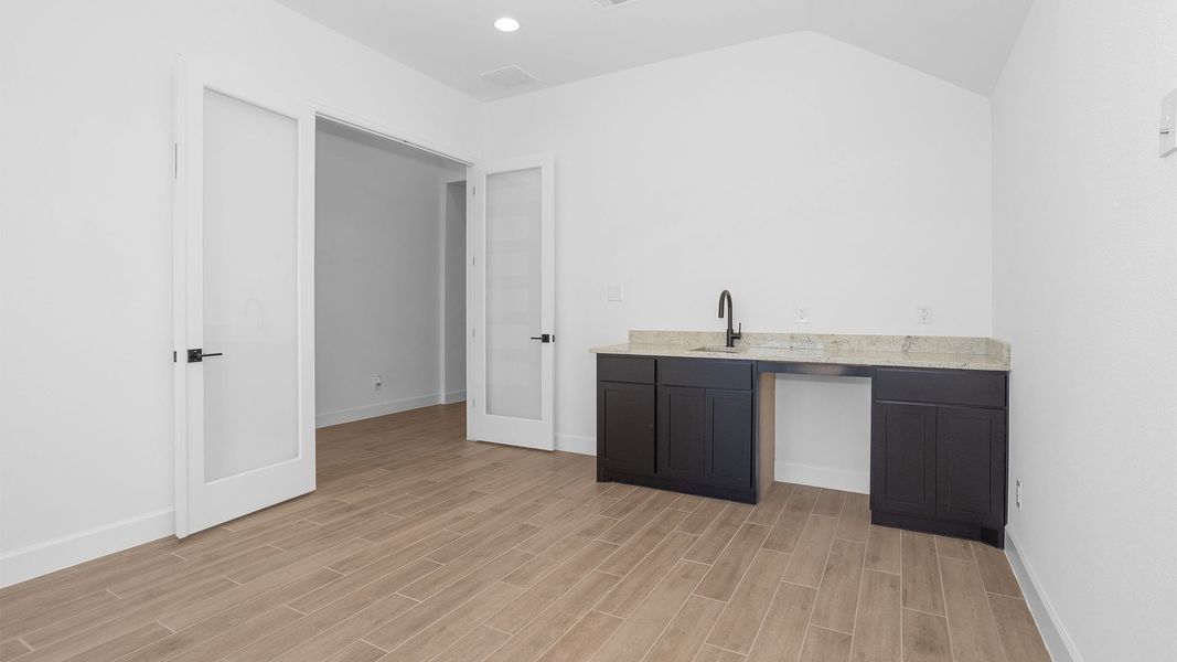 Furnished interior view inside a new home in Legacy, League City (Image 7).