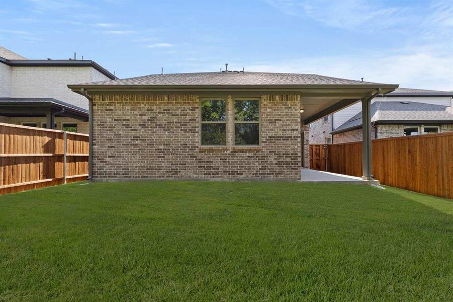Exterior details and patio area of a home in Devonshire 40s, Forney (Image 15). Exterior details and patio area of a home in Devonshire 40s, Forney (Image 15).