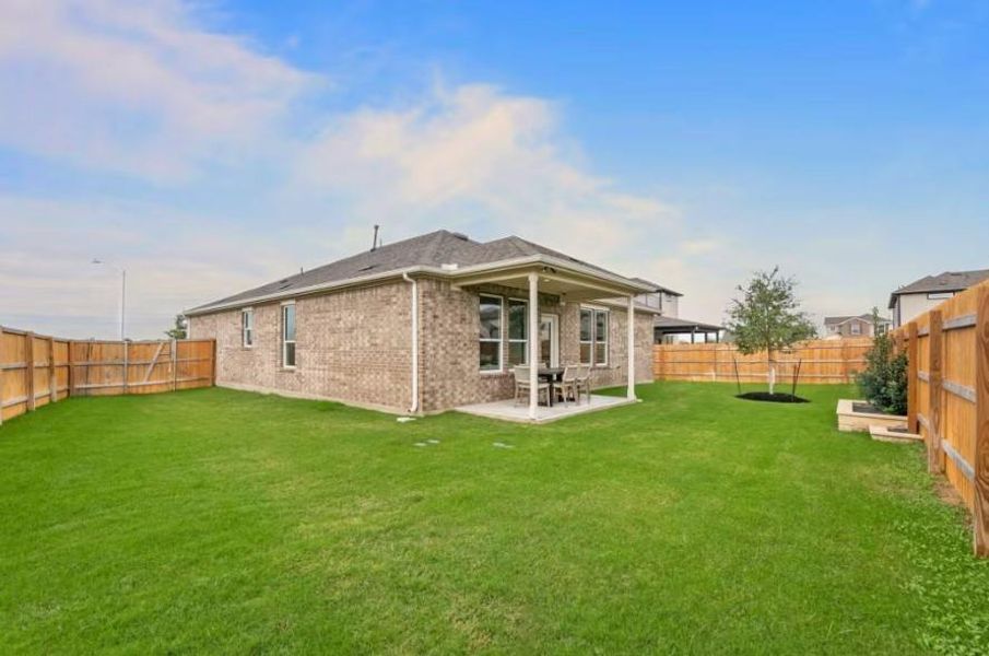 Photo of Pulte model home with same floor plan, not of actual home listed.