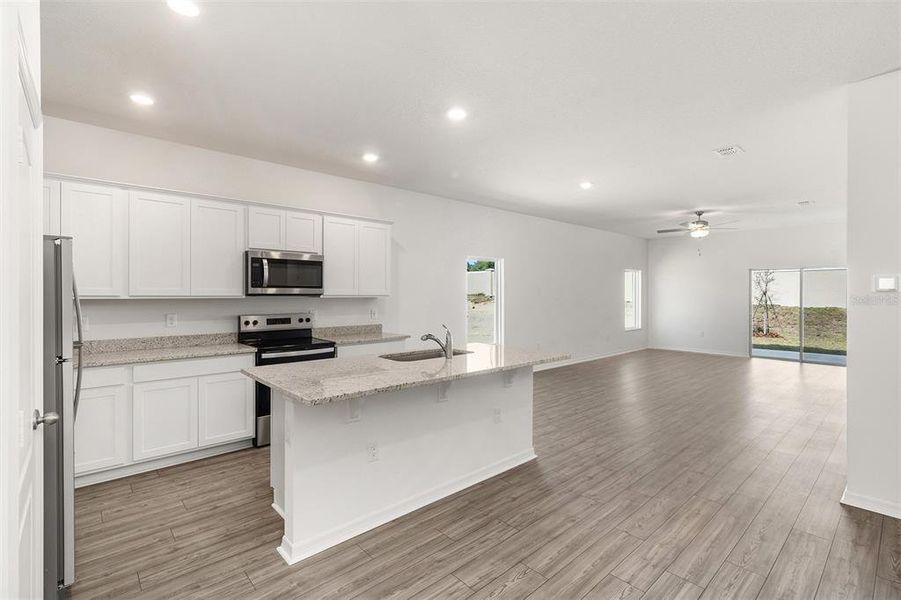 Furnished interior view inside a new home in Peach Crossings, Winter Haven (Image 5). Furnished interior view inside a new home in Peach Crossings, Winter Haven (Image 5).