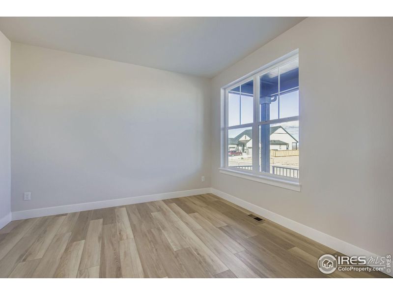 Spacious, unfurnished interior of a new home in RainDance National 60/70, Windsor (Image 15).