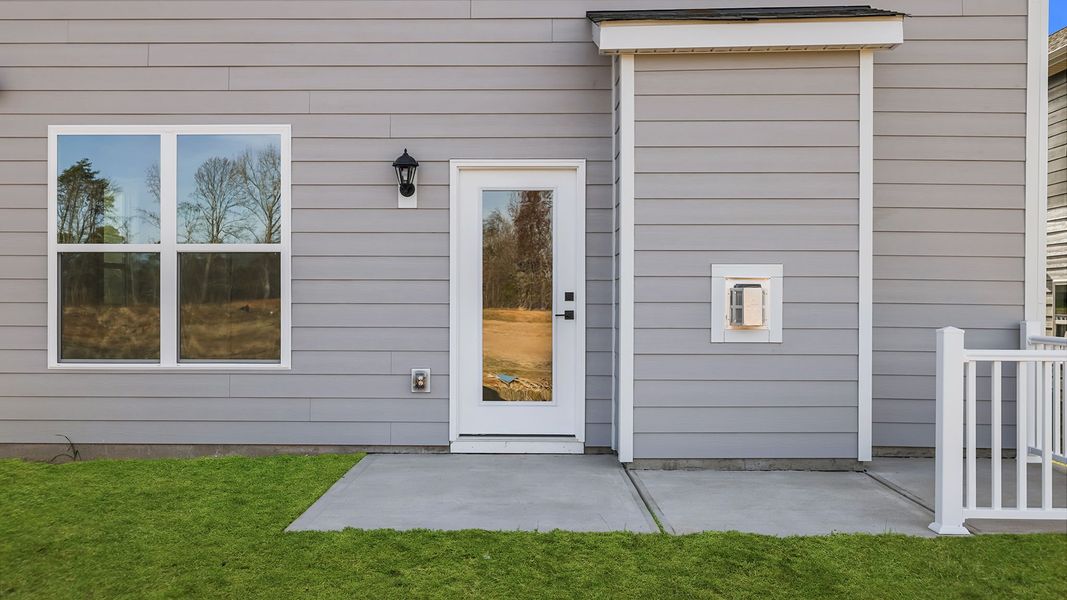 Exterior details and patio area of a home in Adams Glen, Greenville (Image 20).
