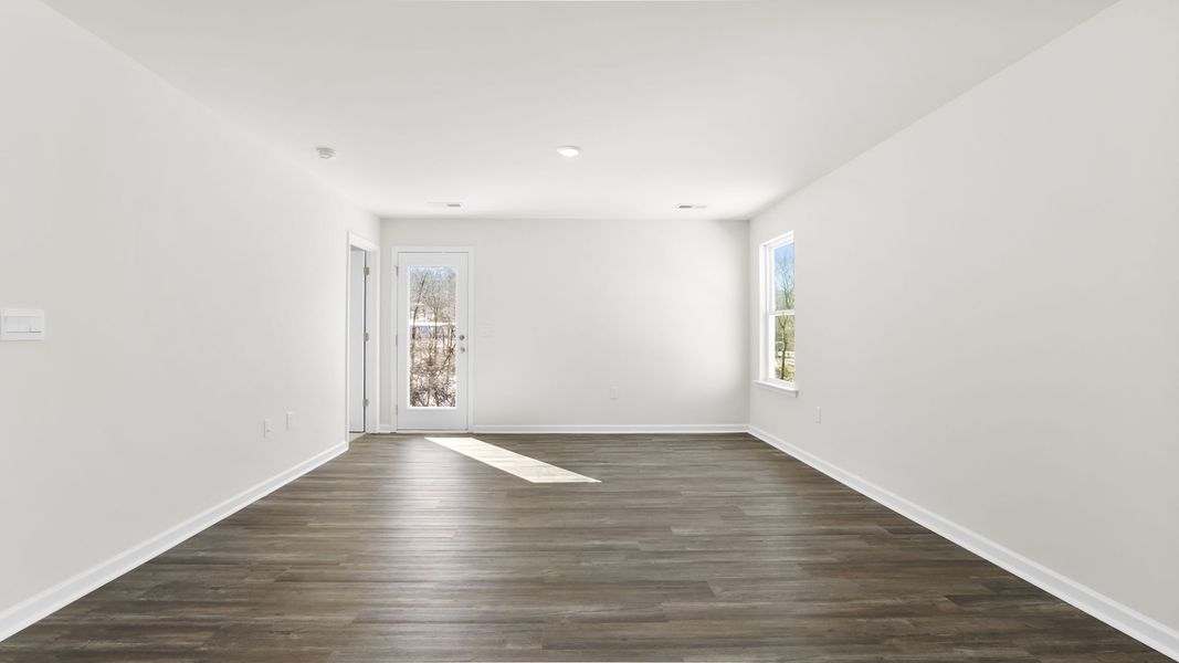 Spacious, unfurnished interior of a new home in Village Grove, Greenville (Image 25).