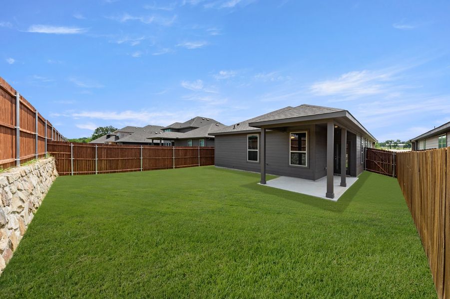 Front exterior of a new home in Keeneland, Aubrey, TX, highlighting curb appeal (Image 26).