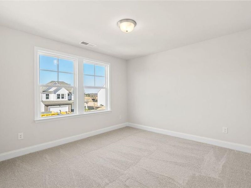 Spacious, unfurnished interior of a new home in Wehunt Meadows, Hoschton (Image 32).