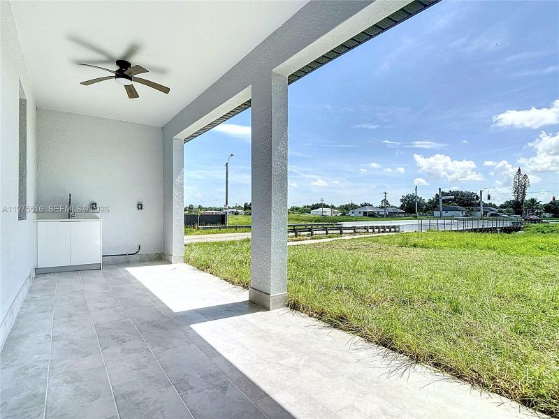Exterior details and patio area of a home in , Lehigh Acres (Image 32). Exterior details and patio area of a home in , Lehigh Acres (Image 32).