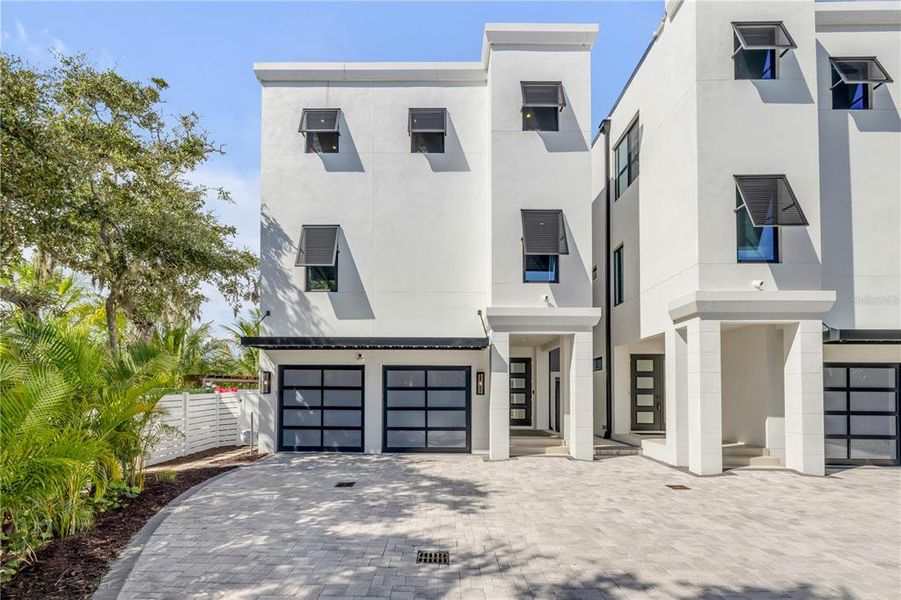 Front exterior of a new home in , New Smyrna Beach, FL, highlighting curb appeal (Image 23). Front exterior of a new home in , New Smyrna Beach, FL, highlighting curb appeal (Image 23).