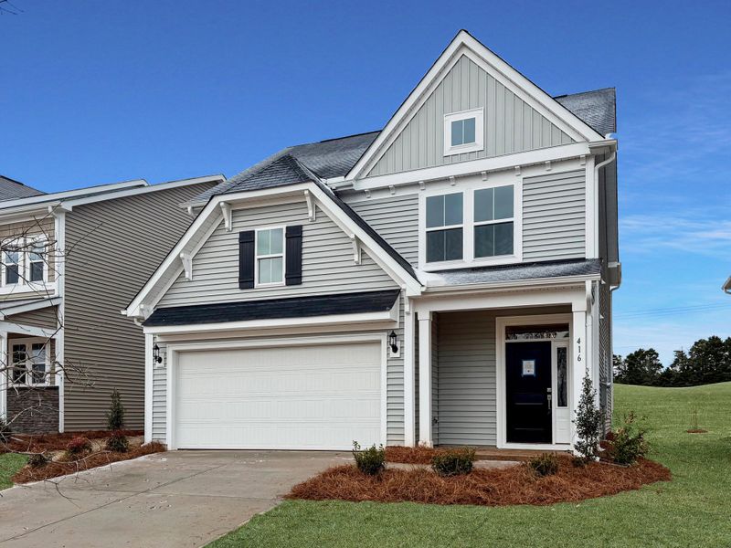 Front exterior of a new home in , Summerville, SC, highlighting curb appeal (Image 1). Front exterior of a new home in , Summerville, SC, highlighting curb appeal (Image 1).