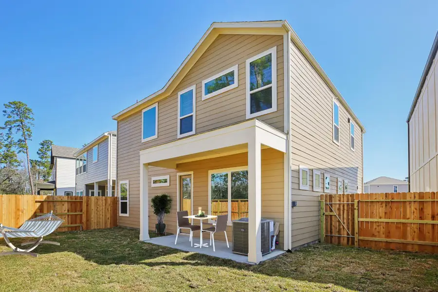 Exterior details and patio area of a home in Pinewood Trails - Luxe Series, Atascocita (Image 3).