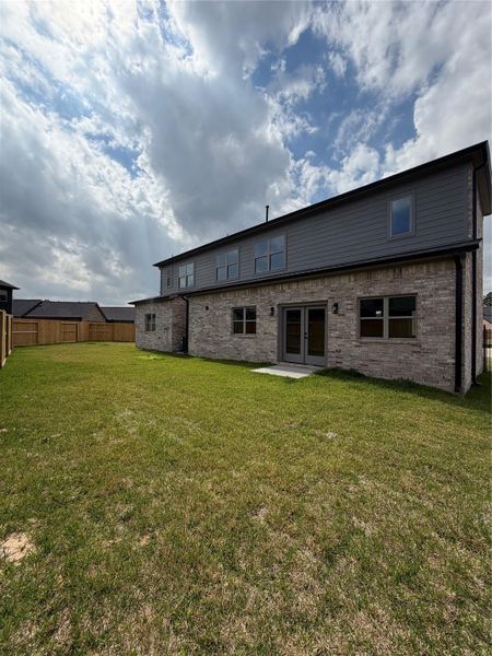 Exterior details and patio area of a home in , Spring (Image 17).